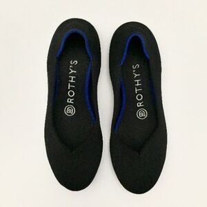 Rothy's Black Flats with Vibrant Blue Accent